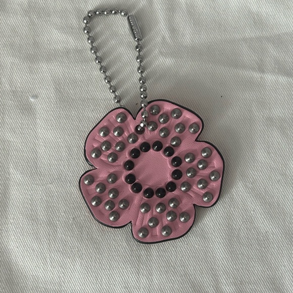 Coach Handbags - COACH STUDDED TEA ROSE CHARM EUC